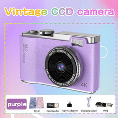 Purple digital camera with 64MP and 4K resolution, featuring a CCD lens. Includes accessories: decal, card reader, Type-C adapter, charging cable, and sling. Ideal for beginners and kids.