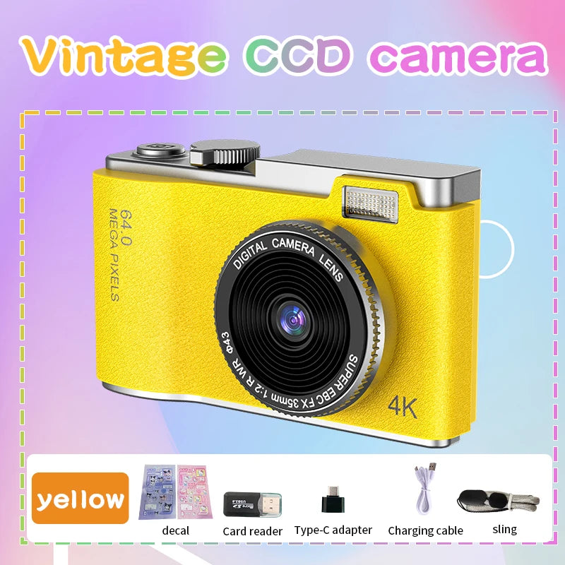 Yellow 4K digital camera with 64MP sensor, shown with accessories including card reader, Type-C adapter, and charging cable.